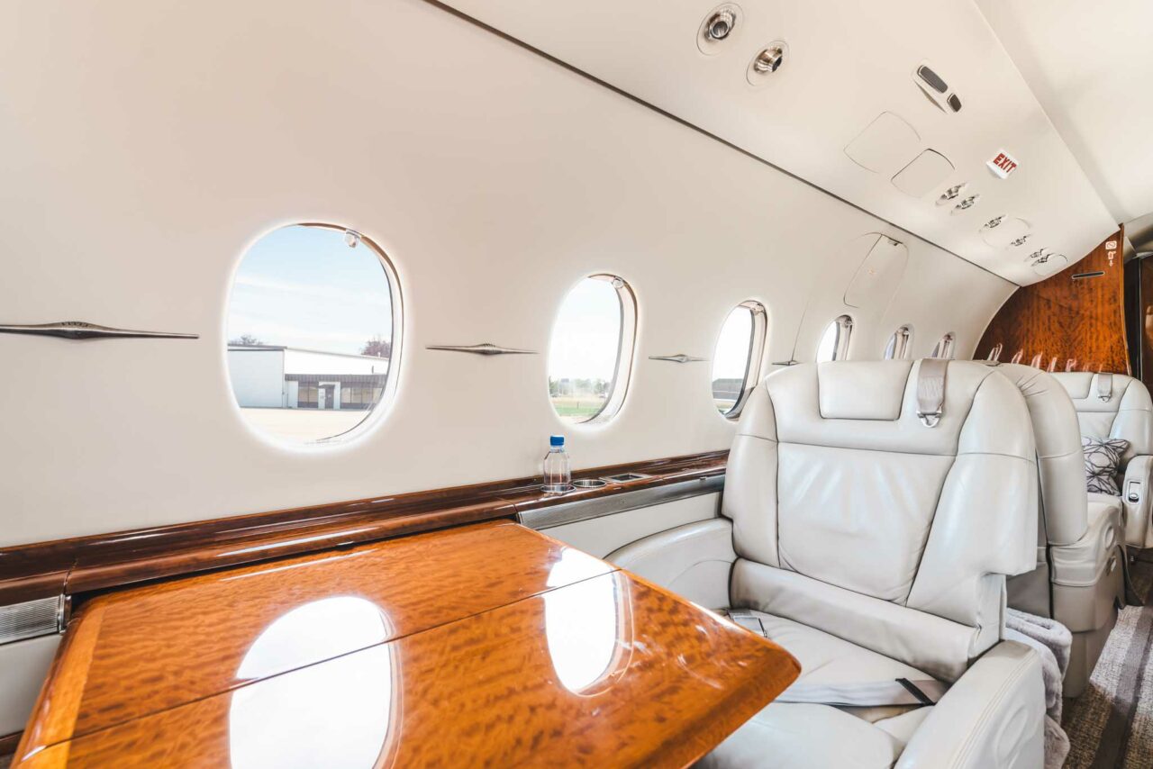 seating and table inside Hawker 4000