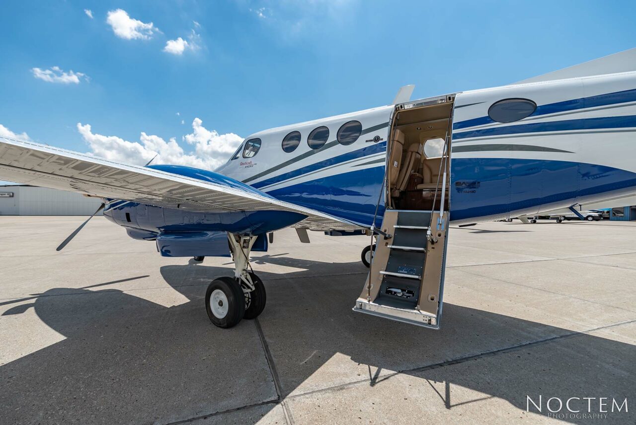 Outside view of King Air E90 with open door